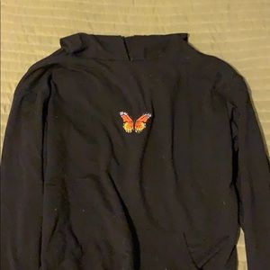 Black hoodie with butterfly patch embroidery